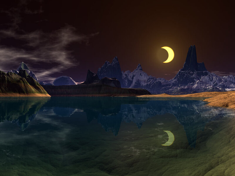 Crescent moon over mountain lake