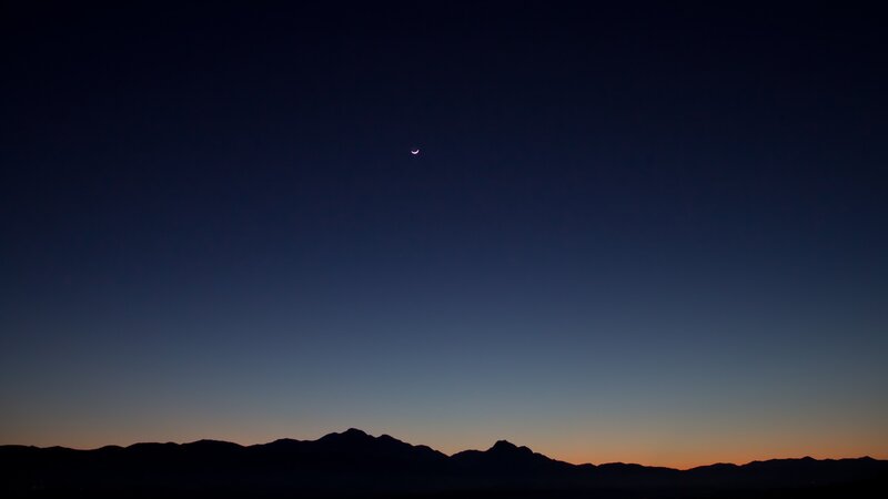 Crescent Moon over Mountains — Dark Blue