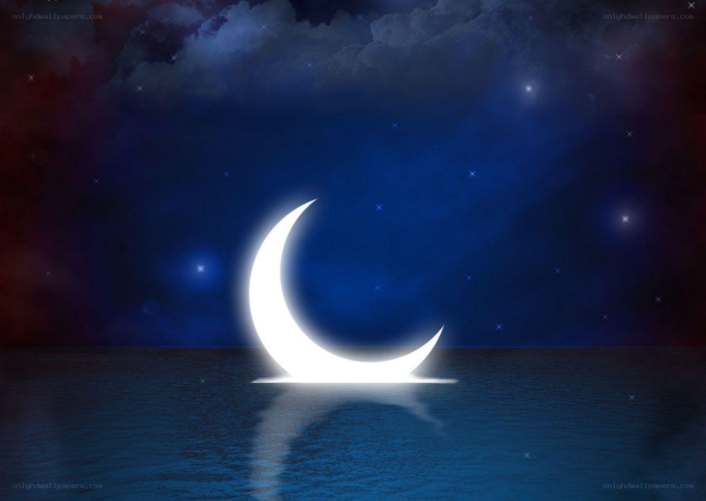 Crescent moon over water