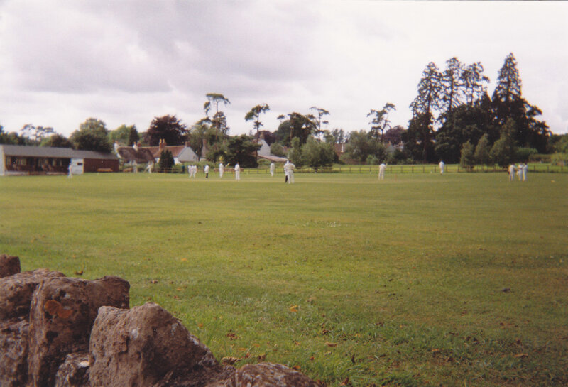 Cricket match on a village green