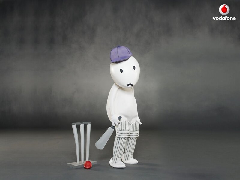 Cricket player figurine