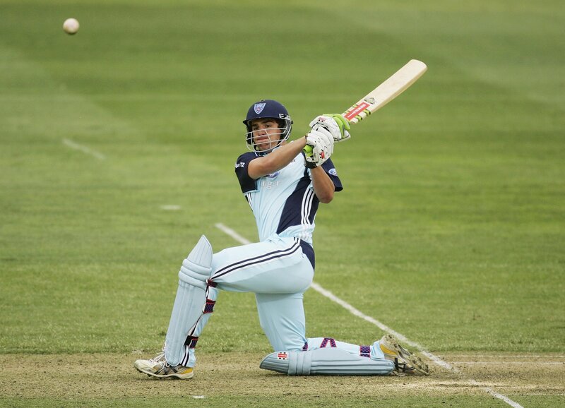 cricketer batting on field