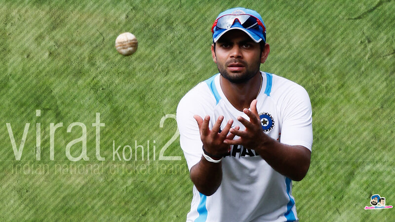Cricketer Catching Ball — Green, Focused