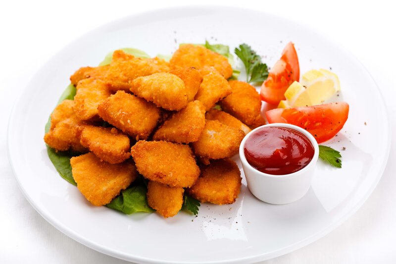 crispy chicken nuggets with ketchup