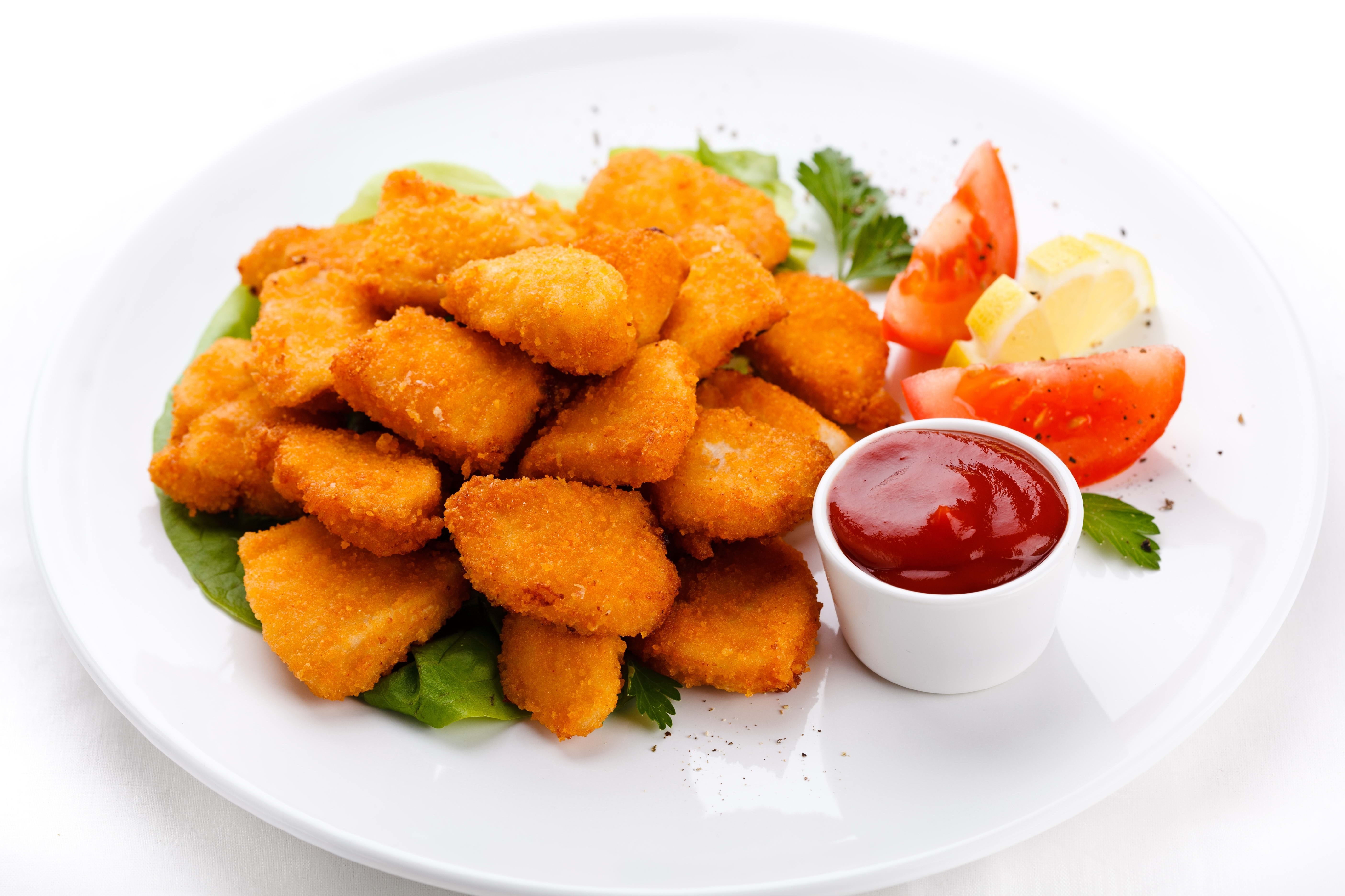 crispy chicken nuggets with ketchup
