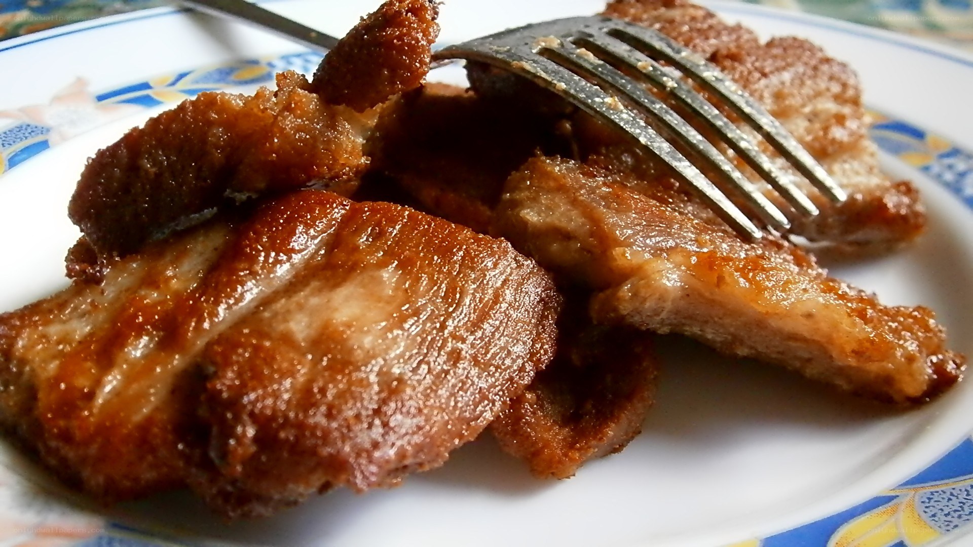 Crispy fried pork on a plate