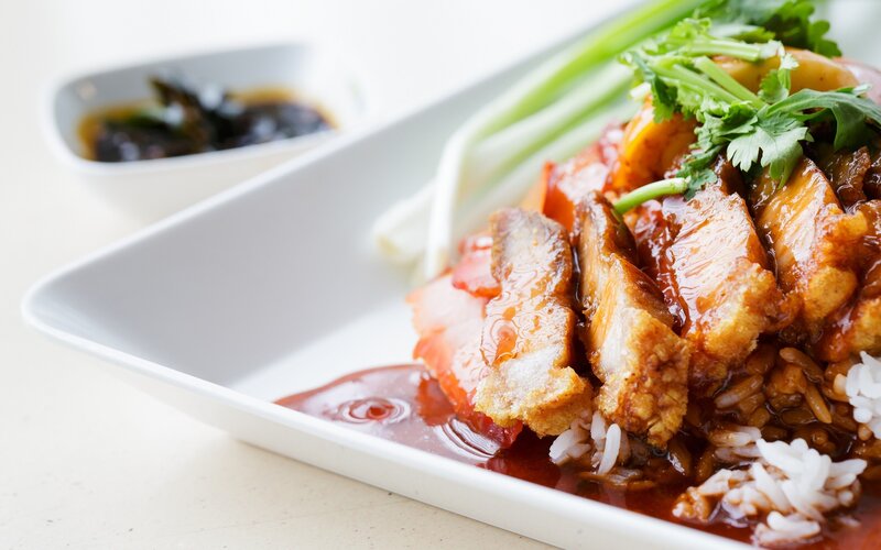 Crispy pork over rice
