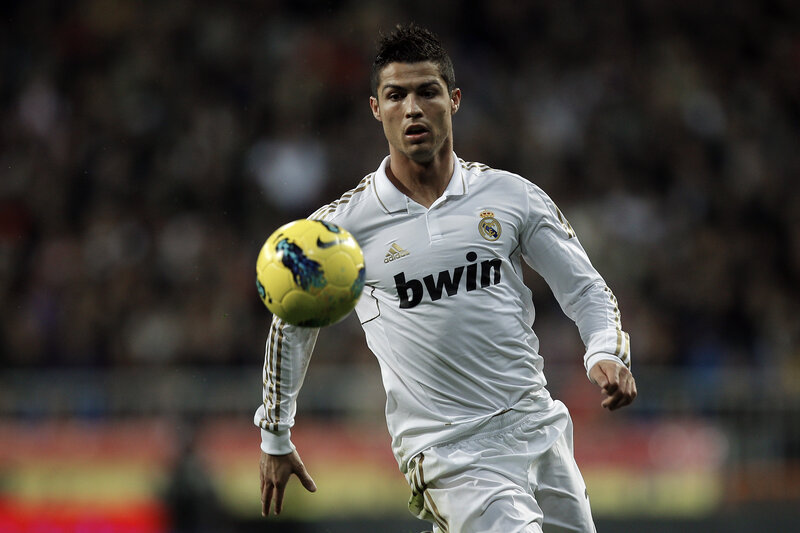 Cristiano Ronaldo Playing Soccer — White, Focused