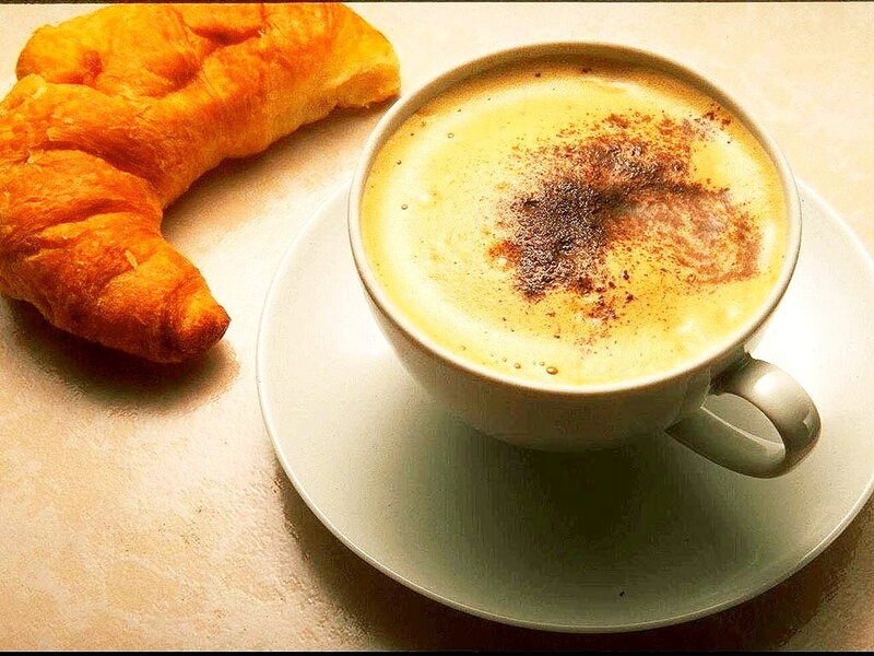 Croissant and Coffee Cup
