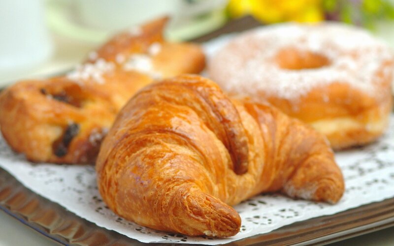 Croissants and pastries on a tray