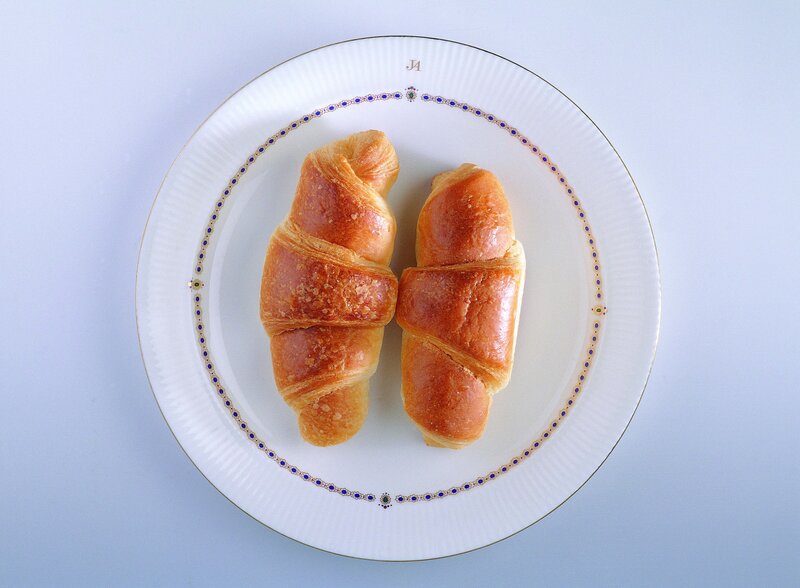 Croissants on a decorative plate