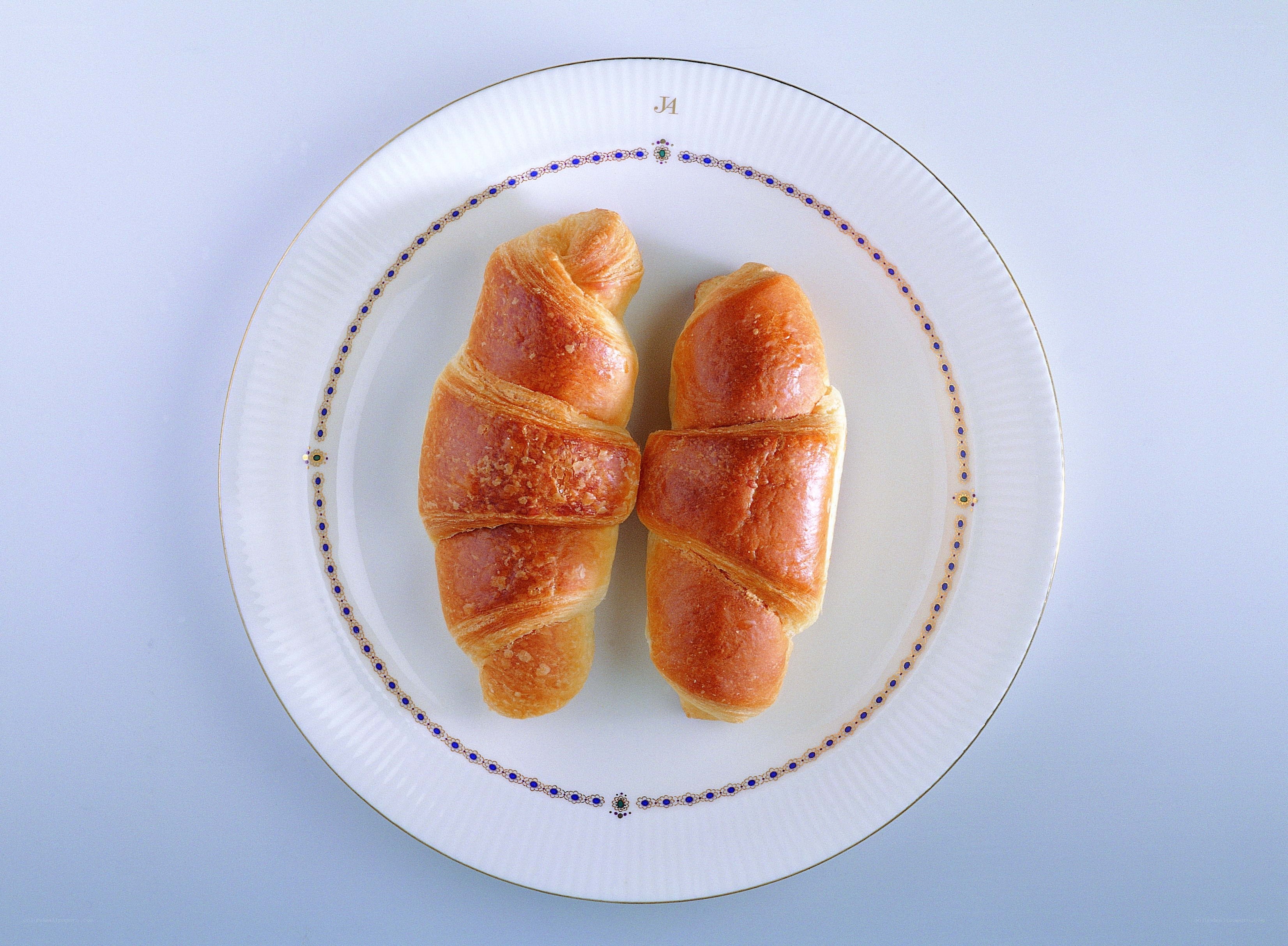 Croissants on a decorative plate