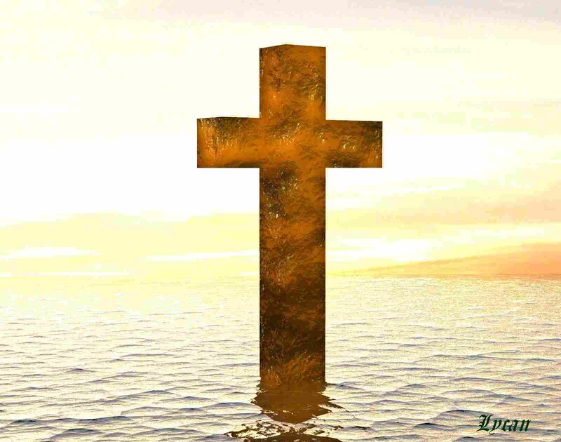 Cross in the water at sunset