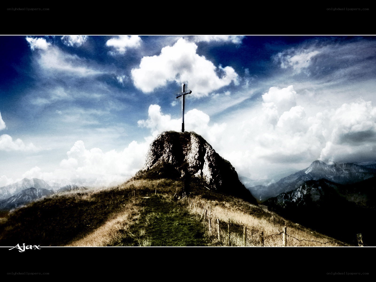 Cross on a mountain peak