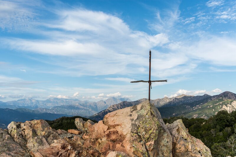 Cross on Mountain Peak — Blue
