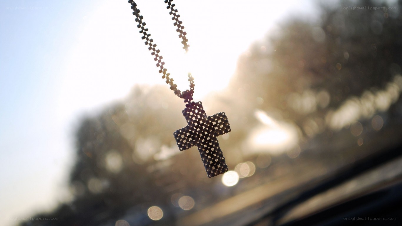 cross pendant in sunlight