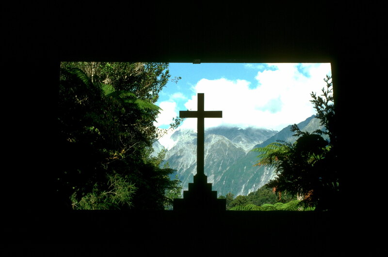 Cross silhouette with mountain view