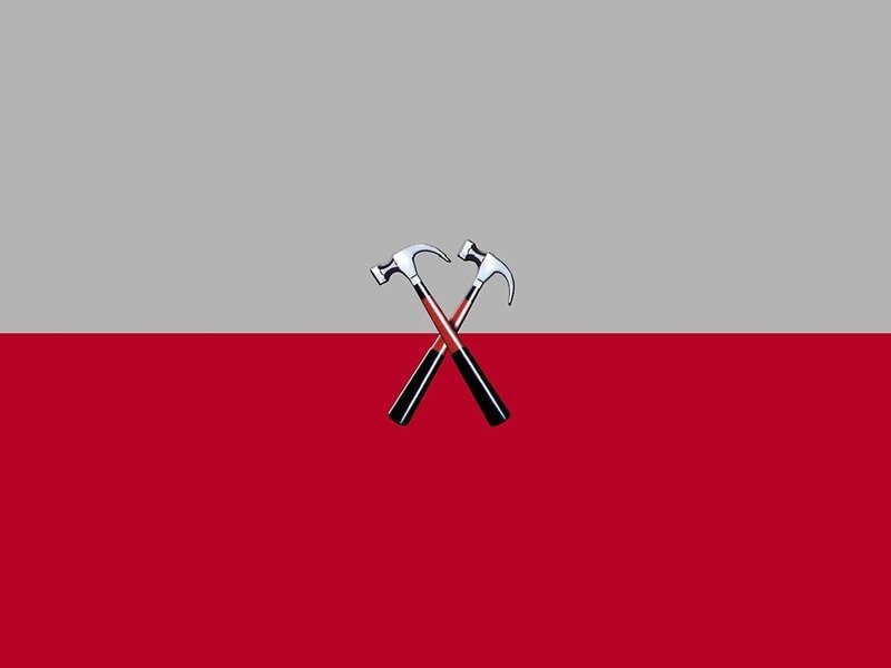Crossed hammers on red and gray