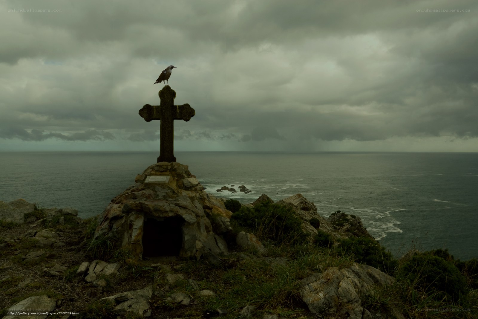 Crow on a coastal cross