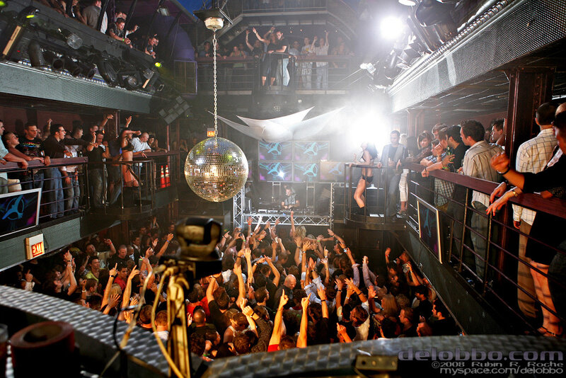 Crowd at a nightclub with disco ball