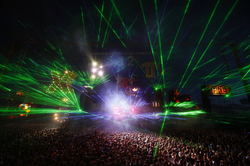 Crowd at Music Festival — Green, Energetic, Night, Photograph, Laser Lights, Stage, Black