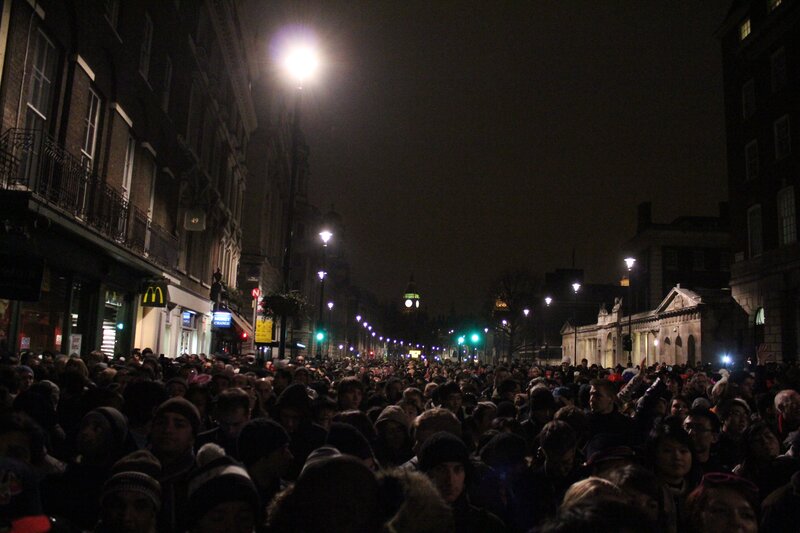 Crowd at night on a city street