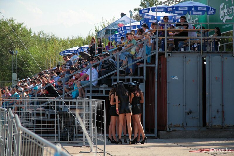 Crowd at outdoor event with models