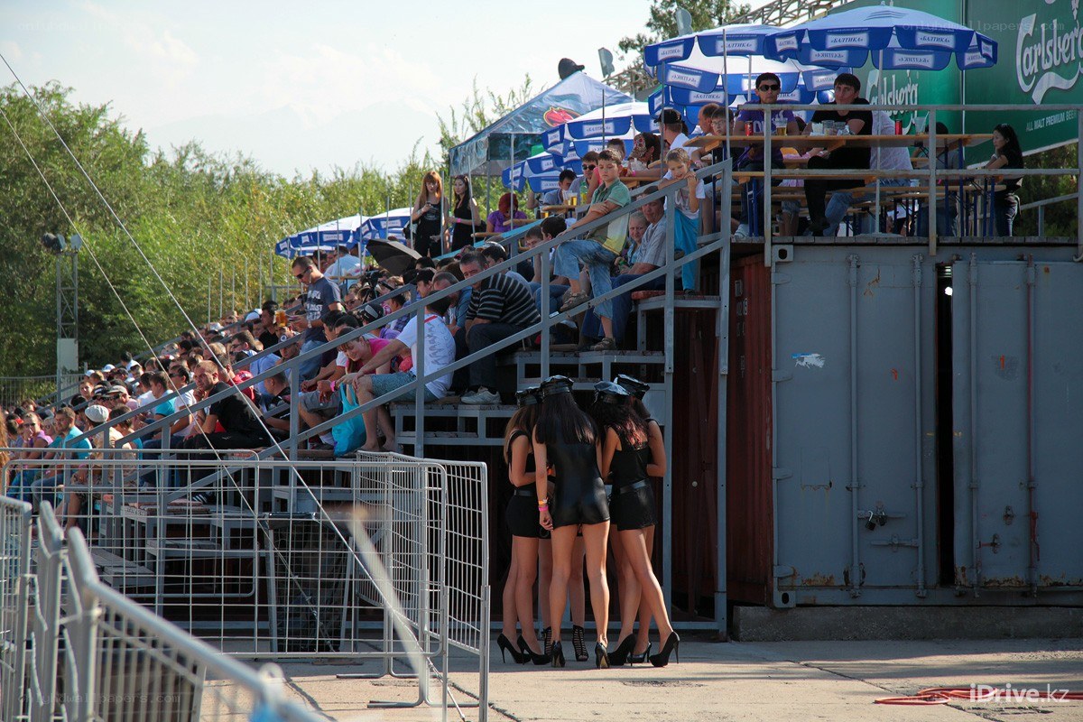 Crowd at outdoor event with models