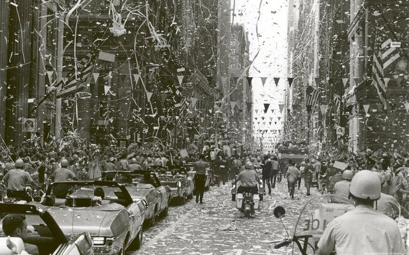 Crowd celebration on a city street
