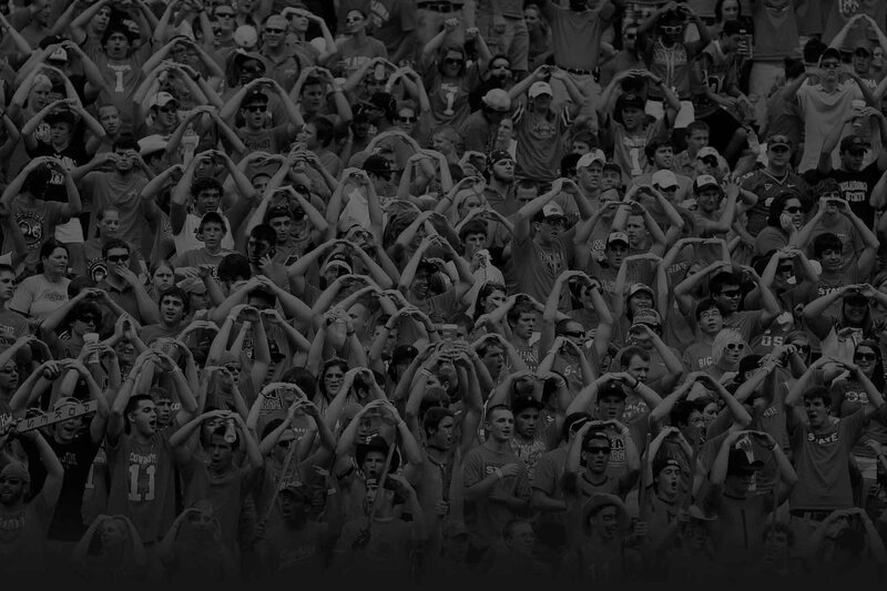 crowd making heart shapes