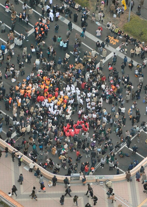 Crowd of People on Street — Gray