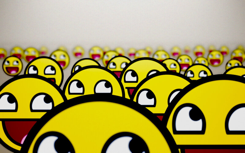 crowd of smiling emojis