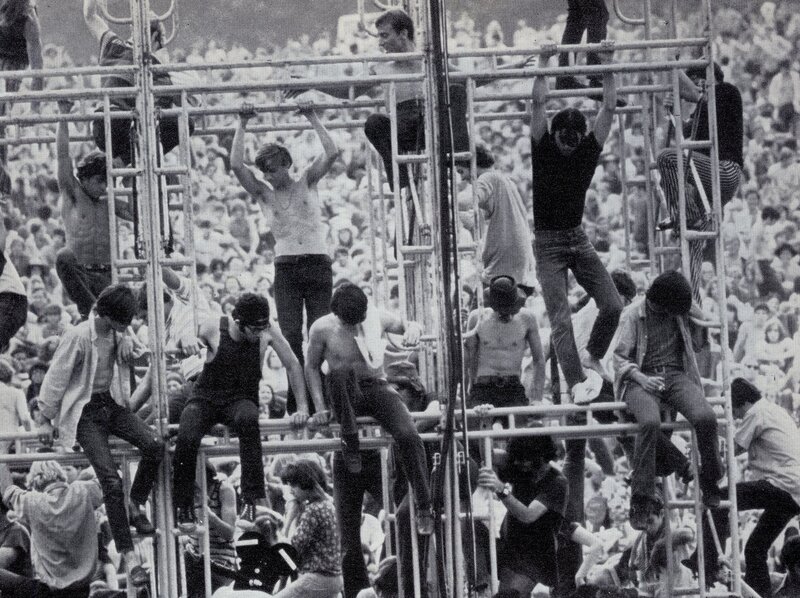 Crowd on metal scaffolding