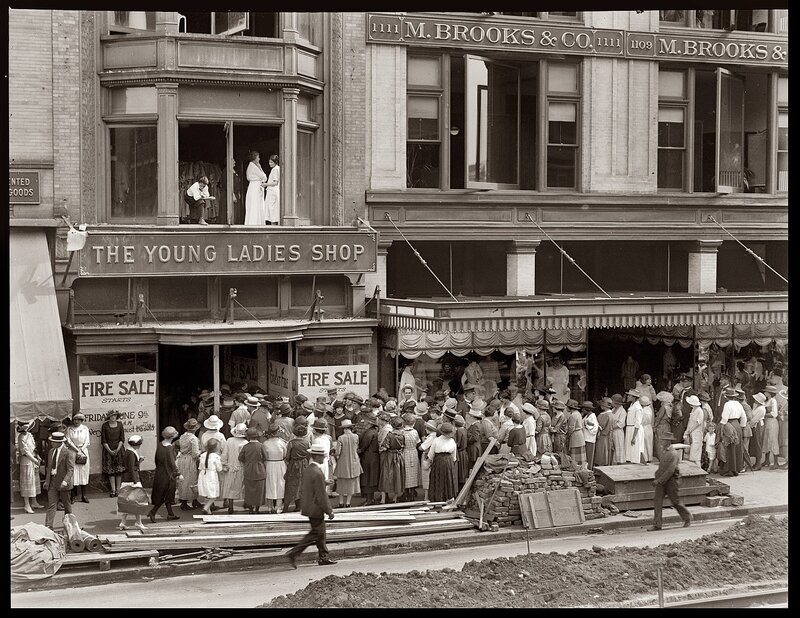 Crowd outside young ladies shop