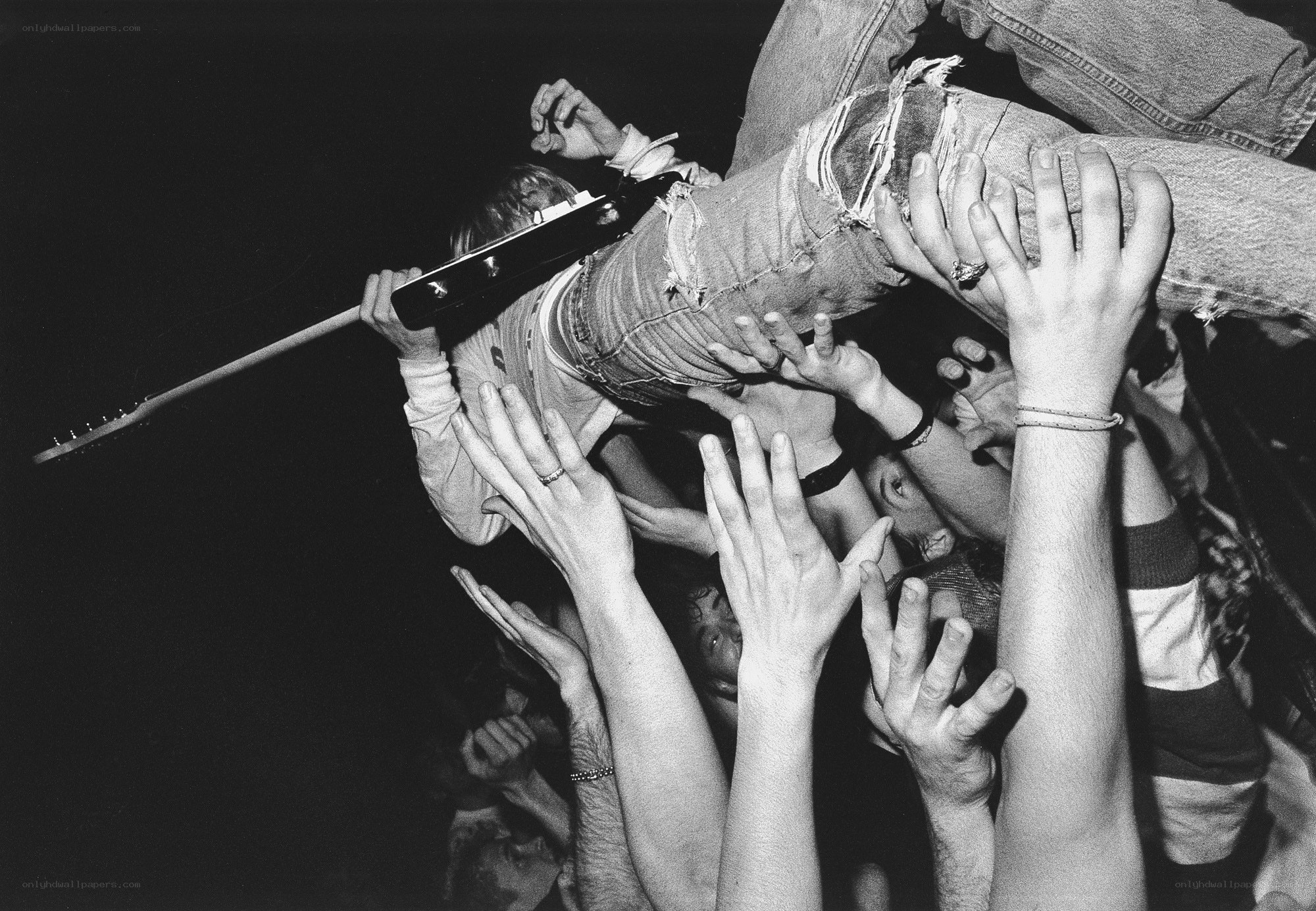 crowd surfing at a concert
