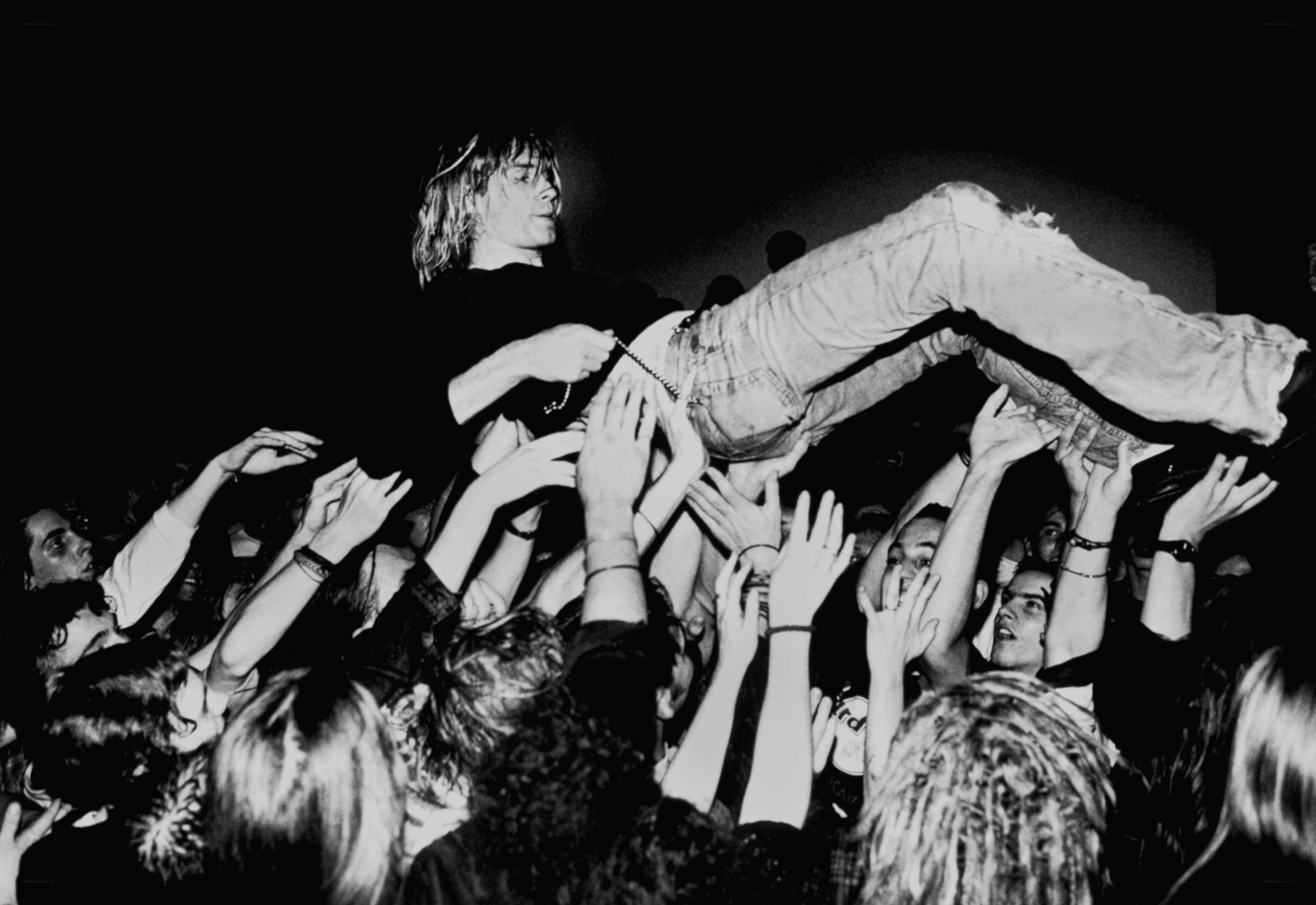 Crowd surfing at a concert