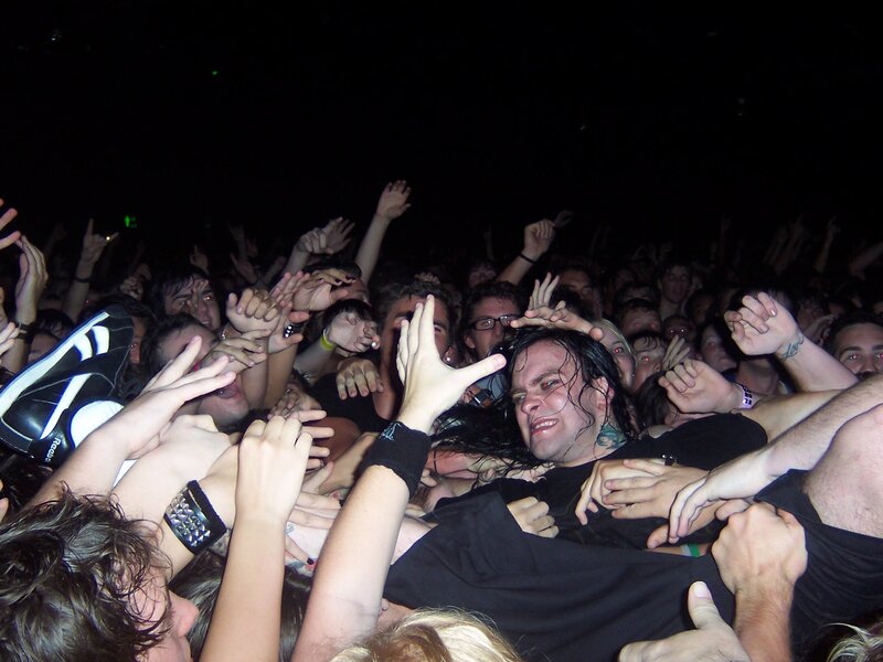 Crowd surfing at a concert