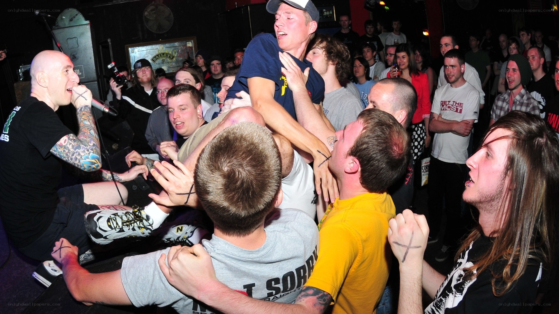 Crowd surfing at a concert