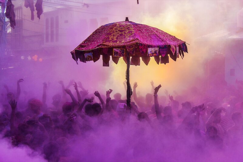 Crowd under Decorated Umbrella