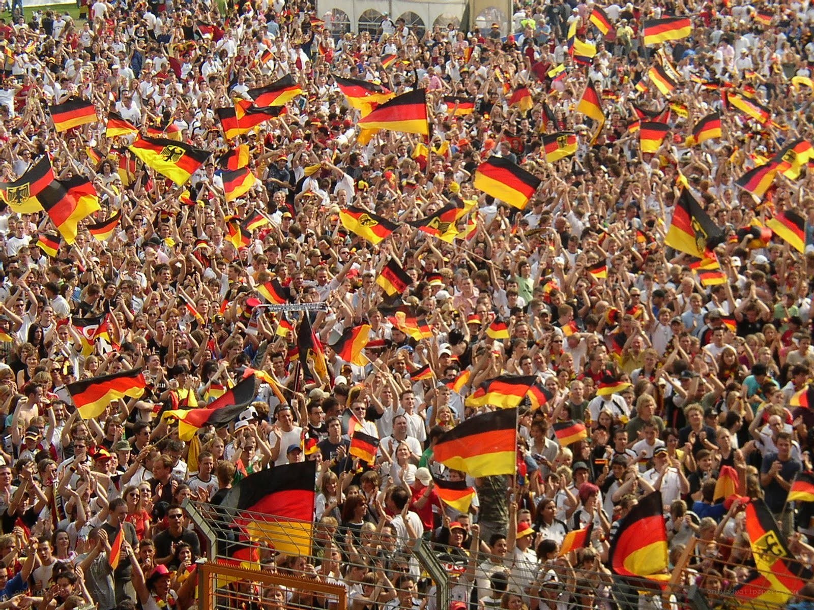 Crowd waving German flags