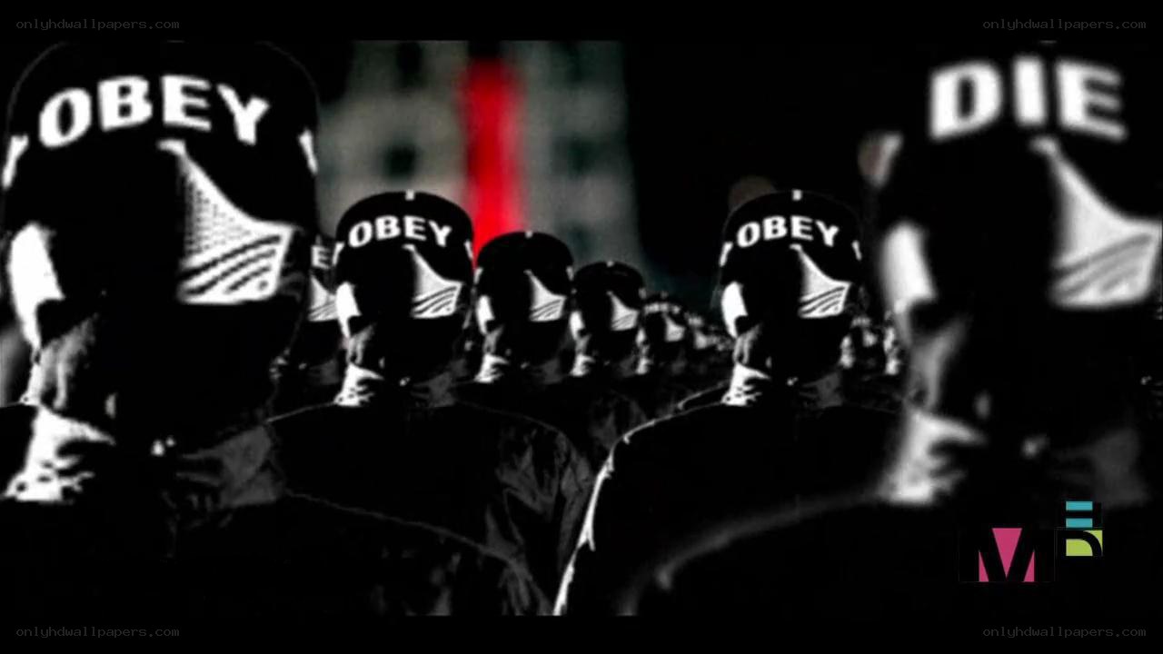 crowd wearing 'OBEY' hats