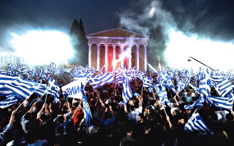 Crowd with Greek Flags