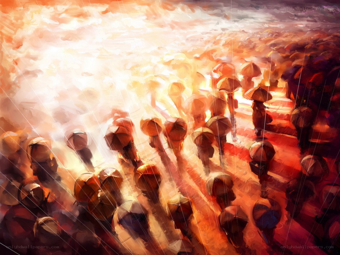 Crowd with umbrellas in sunset