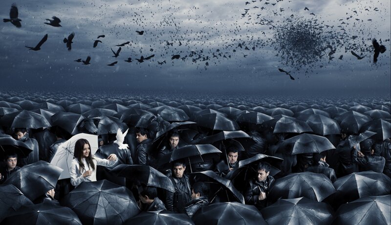 Crowd with Umbrellas