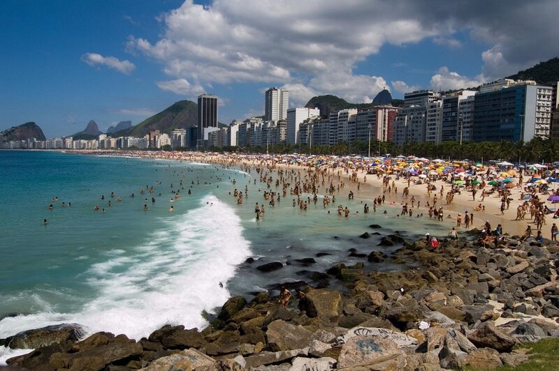 Crowded Beach Scene — Blue, Lively, Afternoon