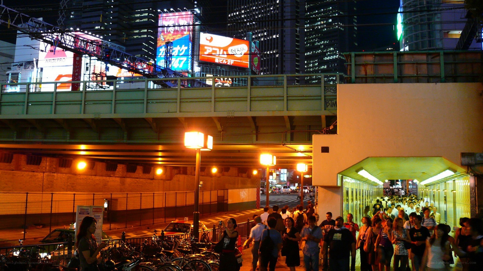 Crowded city street at night