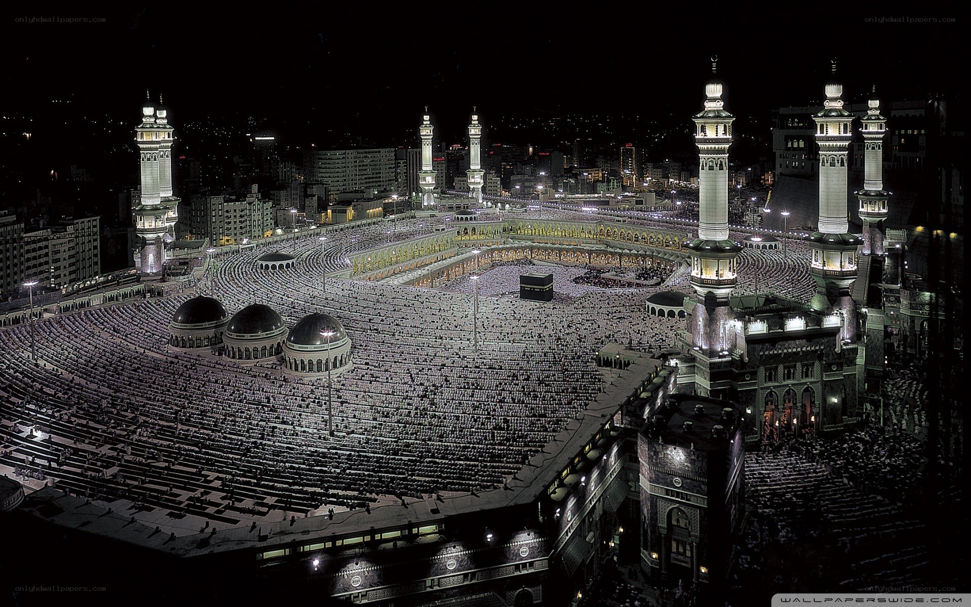 Crowded mosque at night
