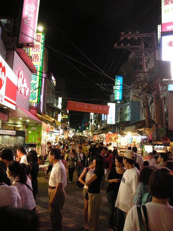 crowded night market street