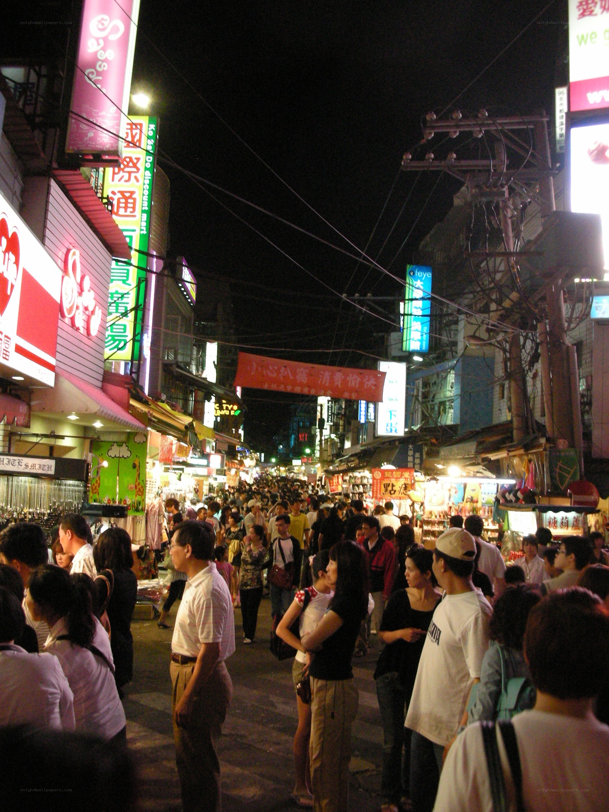 crowded night market street