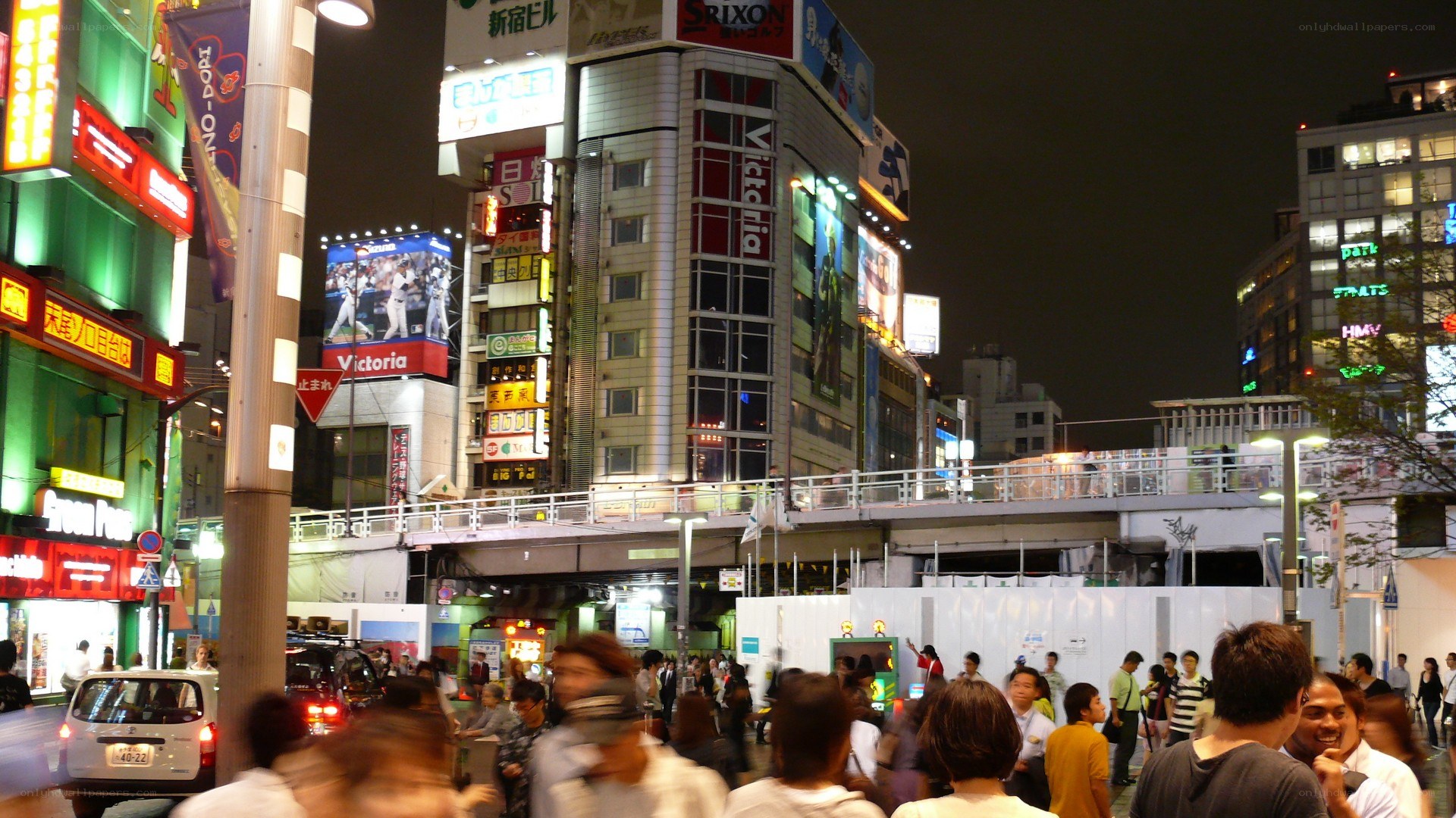 crowded night scene in tokyo